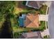 Aerial view of house, pool, and landscaped yard at 6150 42Nd Street E Cir, Bradenton, FL 34203