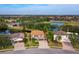 Stunning aerial view of a neighborhood with a lake at 6150 42Nd Street E Cir, Bradenton, FL 34203