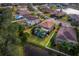 Aerial view of house with pool and screened enclosure at 6150 42Nd Street E Cir, Bradenton, FL 34203