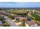 Aerial view showcasing a house and surrounding neighborhood at 6150 42Nd Street E Cir, Bradenton, FL 34203