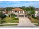 Two-story home with three-car garage and manicured landscaping at 6150 42Nd Street E Cir, Bradenton, FL 34203