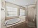 Relaxing bathroom with soaking tub and walk-in shower at 6150 42Nd Street E Cir, Bradenton, FL 34203