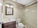 Clean bathroom with single sink vanity and shower at 6150 42Nd Street E Cir, Bradenton, FL 34203