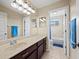 Bathroom with double sink vanity and shower/tub combo at 6150 42Nd Street E Cir, Bradenton, FL 34203