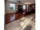 Formal dining room featuring hardwood floors and a large table at 6150 42Nd Street E Cir, Bradenton, FL 34203