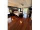 Spacious main bedroom with hardwood floors and sliding doors to balcony at 6150 42Nd Street E Cir, Bradenton, FL 34203