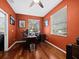 Bright home office with hardwood floors and built-in shelves at 6150 42Nd Street E Cir, Bradenton, FL 34203