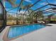 Relaxing screened pool with a water feature at 6150 42Nd Street E Cir, Bradenton, FL 34203