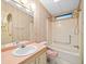 Clean bathroom with tub and updated vanity at 62 Pelican S Dr, Oldsmar, FL 34677