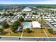 Aerial view of community pool and clubhouse at 62 Pelican S Dr, Oldsmar, FL 34677