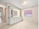 Dining area with built-in hutch and mirrored backsplash at 62 Pelican S Dr, Oldsmar, FL 34677