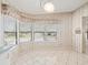 Kitchen dining area with tile floors and window at 62 Pelican S Dr, Oldsmar, FL 34677