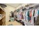 Large walk-in closet with ample shelving and hanging space at 7087 Tamworth Pkwy, Sarasota, FL 34241