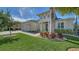 Attractive single-story home with a nicely landscaped front yard at 7087 Tamworth Pkwy, Sarasota, FL 34241