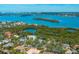 Property is waterfront, near other houses and water at 716 Tropical Cir, Sarasota, FL 34242