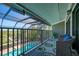 Private balcony offering relaxing seating and pool views at 716 Tropical Cir, Sarasota, FL 34242