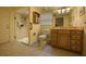 Bathroom with walk-in shower, toilet and vanity at 716 Tropical Cir, Sarasota, FL 34242