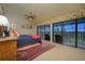 Main bedroom with private balcony and picturesque views at 716 Tropical Cir, Sarasota, FL 34242