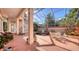 Peaceful courtyard with fountain, lush landscaping, and seating area at 7349 Windemere Ln, University Park, FL 34201