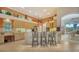 Well-equipped kitchen featuring light wood cabinets at 7349 Windemere Ln, University Park, FL 34201