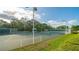 Well-maintained tennis courts with ample surrounding space at 7349 Windemere Ln, University Park, FL 34201