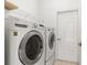 Laundry room with LG washer and dryer at 7432 39Th E Ct, Sarasota, FL 34243