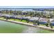 Community aerial view showcasing lakefront homes at 7876 Grande Shores Dr, Sarasota, FL 34240