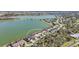 Community overview showcasing waterfront properties and lush greenery at 7876 Grande Shores Dr, Sarasota, FL 34240