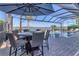 Enjoy this amazing pool and spa with a lake view at 7876 Grande Shores Dr, Sarasota, FL 34240