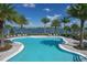 Relaxing resort-style pool with plenty of lounge chairs at 7876 Grande Shores Dr, Sarasota, FL 34240