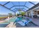 Large screened pool with plenty of space for relaxation at 7876 Grande Shores Dr, Sarasota, FL 34240