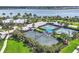 Two tennis courts and two pickleball courts in a community setting at 7876 Grande Shores Dr, Sarasota, FL 34240