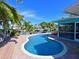 Relaxing poolside view overlooking the canal at 10404 Sandpiper W Rd, Bradenton, FL 34209