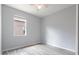 This bedroom features a window letting in natural light and tile flooring at 11715 Summer Springs Dr, Riverview, FL 33579