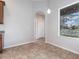 Inviting dining area with bright window showcasing serene pond views at 11715 Summer Springs Dr, Riverview, FL 33579