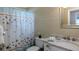 Bathroom with a shower/tub combo and updated vanity at 1228 Siesta Bayside Dr # 1228-C, Sarasota, FL 34242