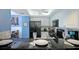 Modern kitchen with black appliances and granite countertops at 1228 Siesta Bayside Dr # 1228-C, Sarasota, FL 34242