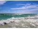 Stunning ocean view with waves and blue skies at 1228 Siesta Bayside Dr # 1228-C, Sarasota, FL 34242