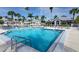 Community swimming pool with ample deck space for lounging at 1228 Siesta Bayside Dr # 1228-C, Sarasota, FL 34242