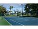 Community tennis court for recreational activities at 1228 Siesta Bayside Dr # 1228-C, Sarasota, FL 34242