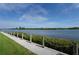 Peaceful waterfront walkway with mangrove trees and water views at 1228 Siesta Bayside Dr # 1228-C, Sarasota, FL 34242