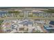 Community clubhouse and pool under construction with surrounding homes and lakes at 13608 Sunset Sapphire Ct, Parrish, FL 34219
