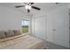Bedroom with a double bed and large window at 13608 Sunset Sapphire Ct, Parrish, FL 34219