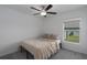Bedroom with a double bed and ceiling fan at 13608 Sunset Sapphire Ct, Parrish, FL 34219