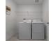 Laundry room with washer, dryer, and shelving at 13608 Sunset Sapphire Ct, Parrish, FL 34219