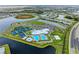 Aerial view showing community amenities including pools and tennis courts at 14824 Lyla Ter, Bradenton, FL 34211