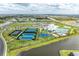 Aerial view of community amenities including pool, tennis, and courts at 14824 Lyla Ter, Bradenton, FL 34211