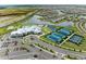 Aerial view showing community clubhouse, pools, tennis and pickleball courts at 14824 Lyla Ter, Bradenton, FL 34211