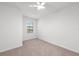 Spacious bedroom with carpeted floor and large window at 14824 Lyla Ter, Bradenton, FL 34211