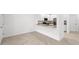 Modern kitchen featuring granite countertops and stainless steel appliances at 14824 Lyla Ter, Bradenton, FL 34211